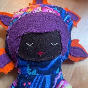 Colorful Fabric Doll with Purple and Orange Accents